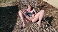 play Blonde MILF Gets Off in Public on a Hammock
